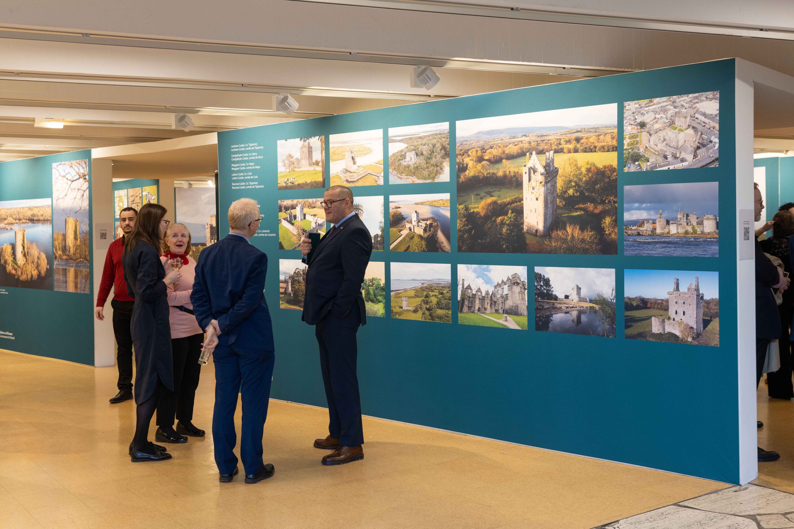 People attend a NMS Photographic Exhibition