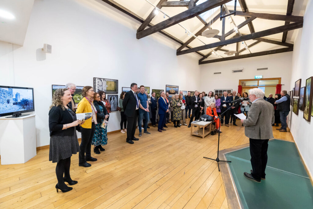 People gather at an exhibiton opening in Portlaoise 
